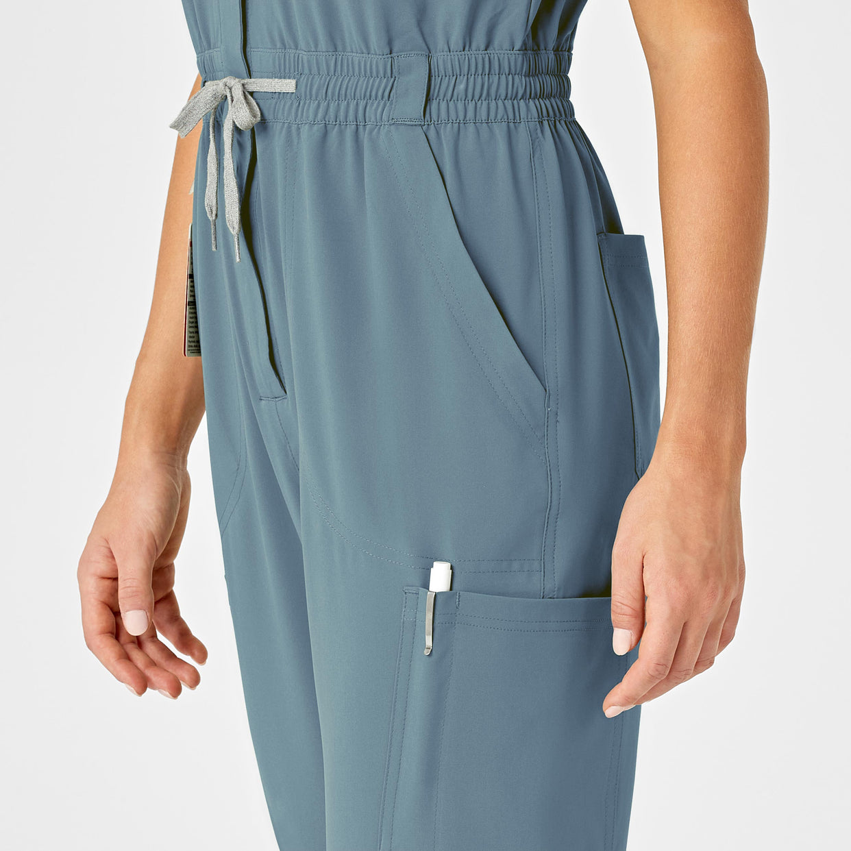 RENEW Women's Zip Front Jumpsuit Elemental Blue hemline detail