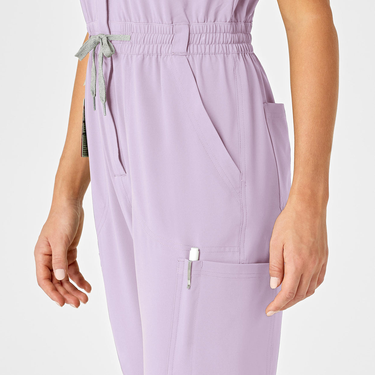 RENEW Women's Zip Front Scrub Jumpsuit Pastel Lilac cargo pocket detail