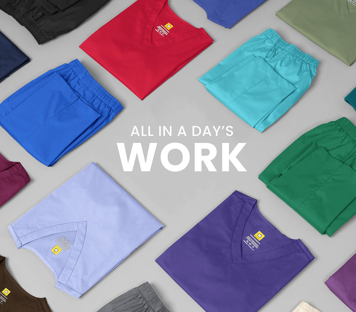 "All in a day's work" Variety of folded scrub tops and scrub pants
