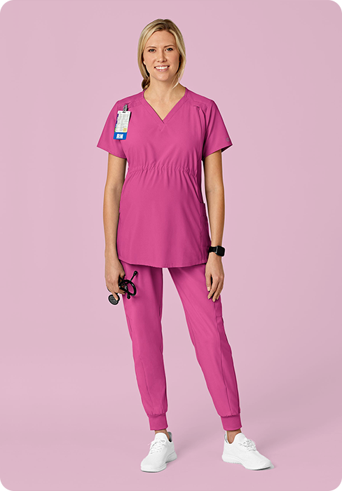 Woman in pink maternity scrubs