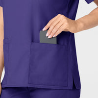 WonderWORK Women's V-Neck Scrub Top Grape hemline detail