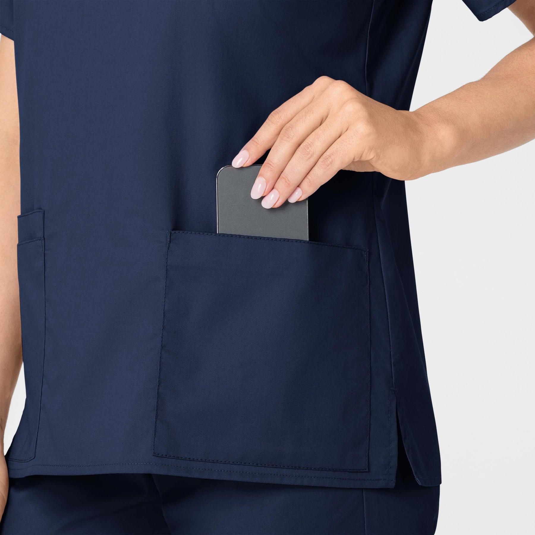 WonderWORK Women's V-Neck Scrub Top Navy hemline detail
