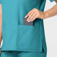 WonderWORK Women's V-Neck Scrub Top Teal Blue hemline detail