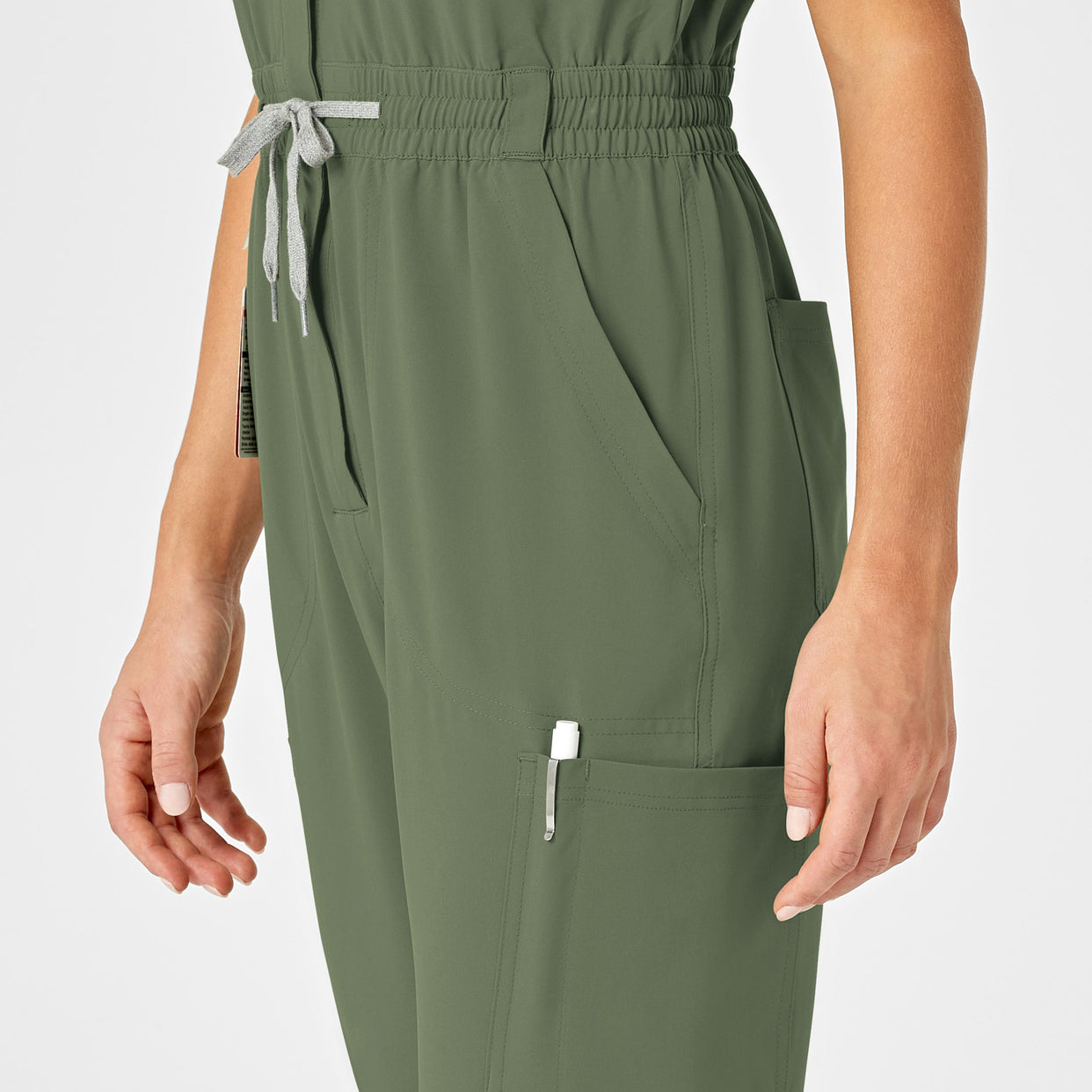 RENEW Women's Zip Front Jumpsuit Olive hemline detail