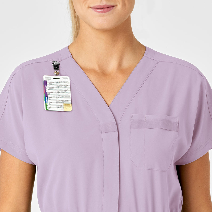 RENEW Women's Zip Front Scrub Jumpsuit Pastel Lilac badge loop detail