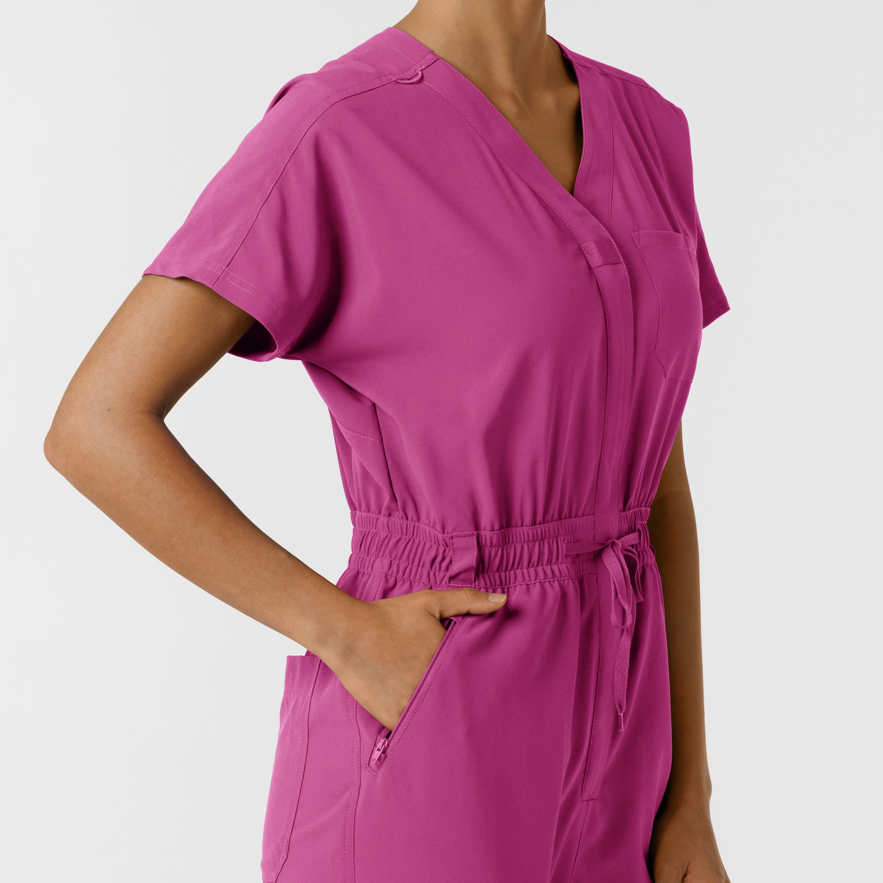 RENEW Women's Cargo Jogger Scrub Jumpsuit Raspberry hemline detail