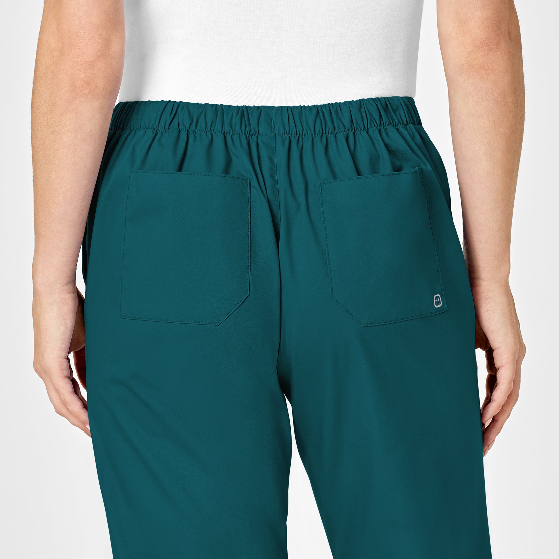 WonderWORK Women's Flare Leg Scrub Pant Caribbean Blue hemline detail