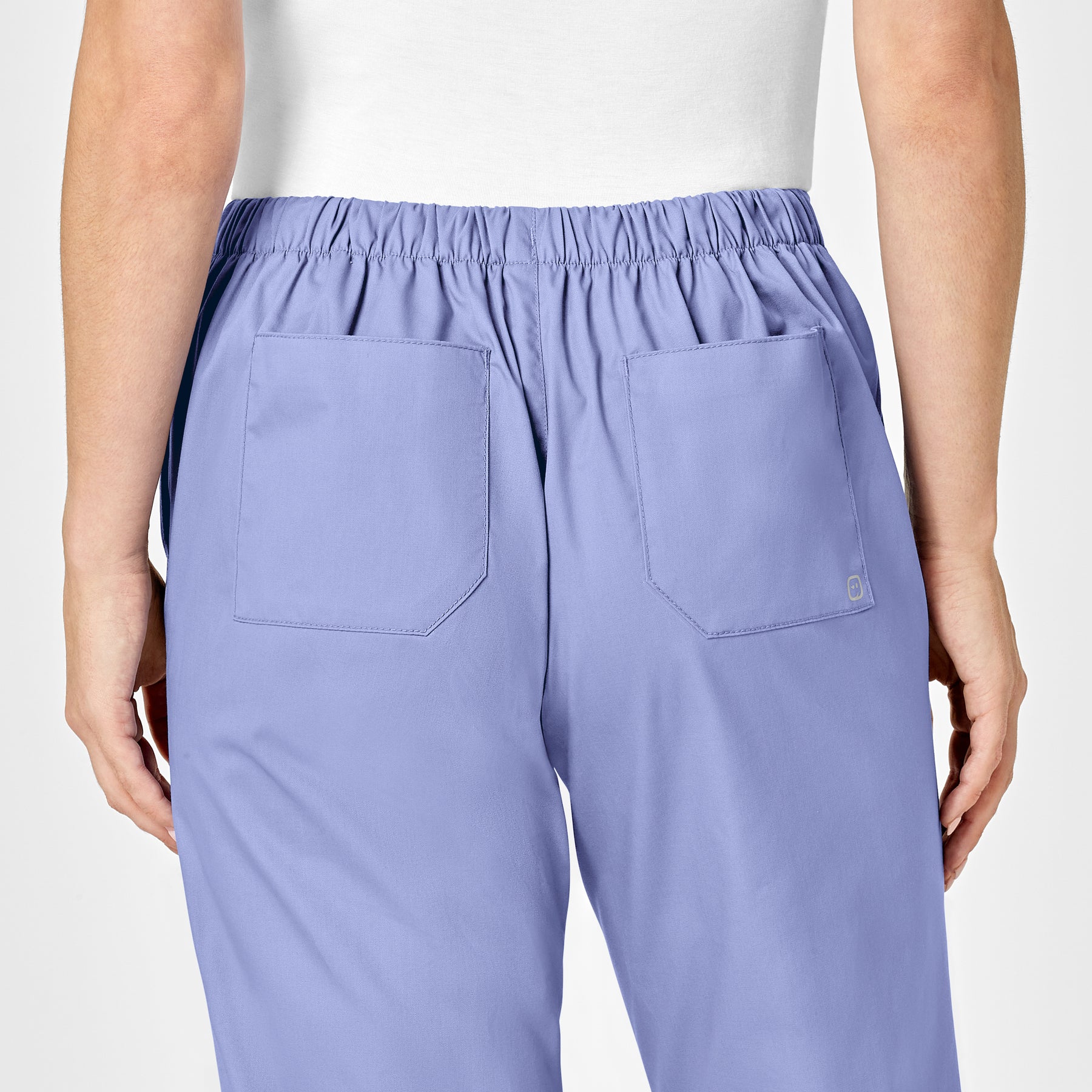 WonderWORK Women's Flare Leg Scrub Pant Ceil Blue hemline detail