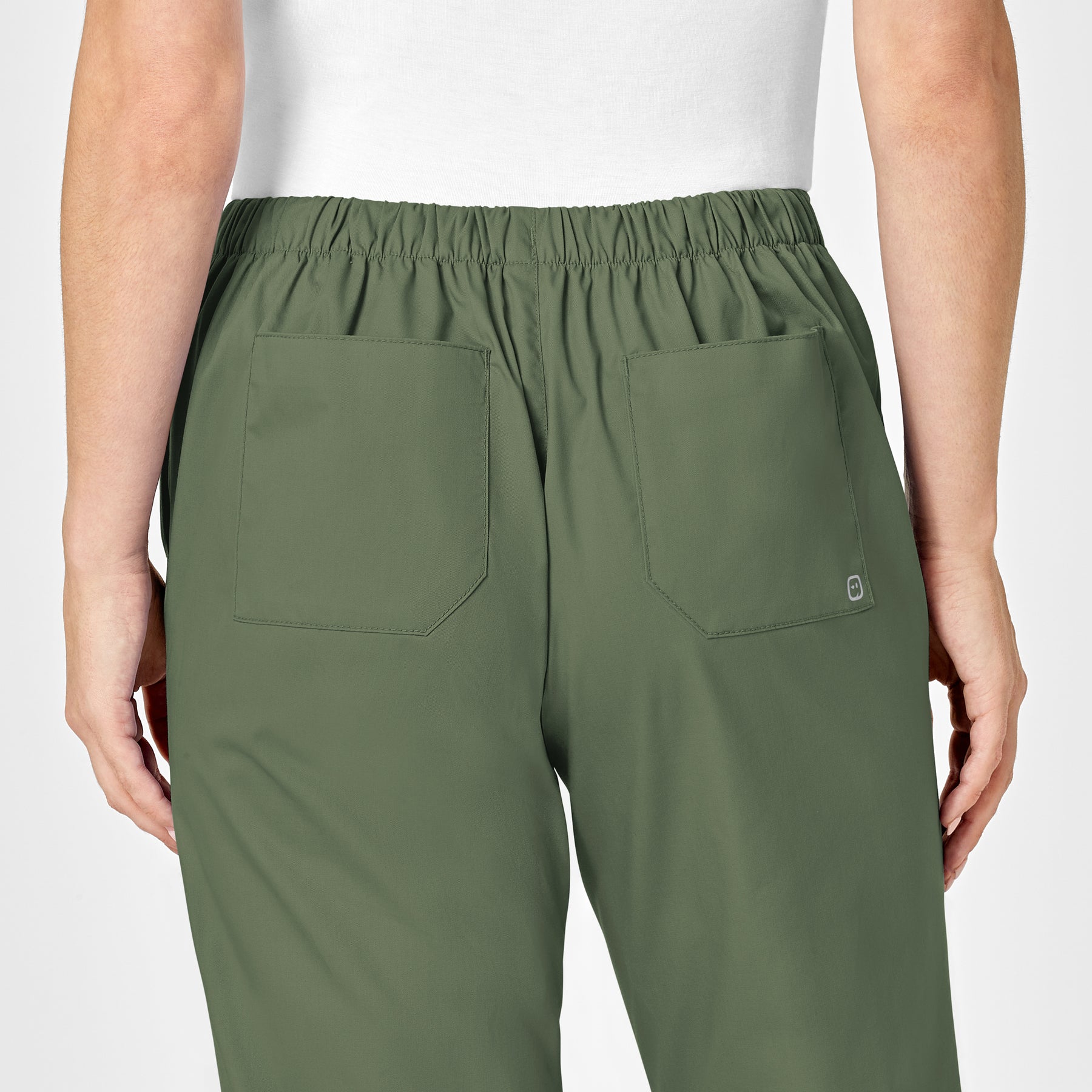 WonderWORK Women's Flare Leg Scrub Pant Olive hemline detail
