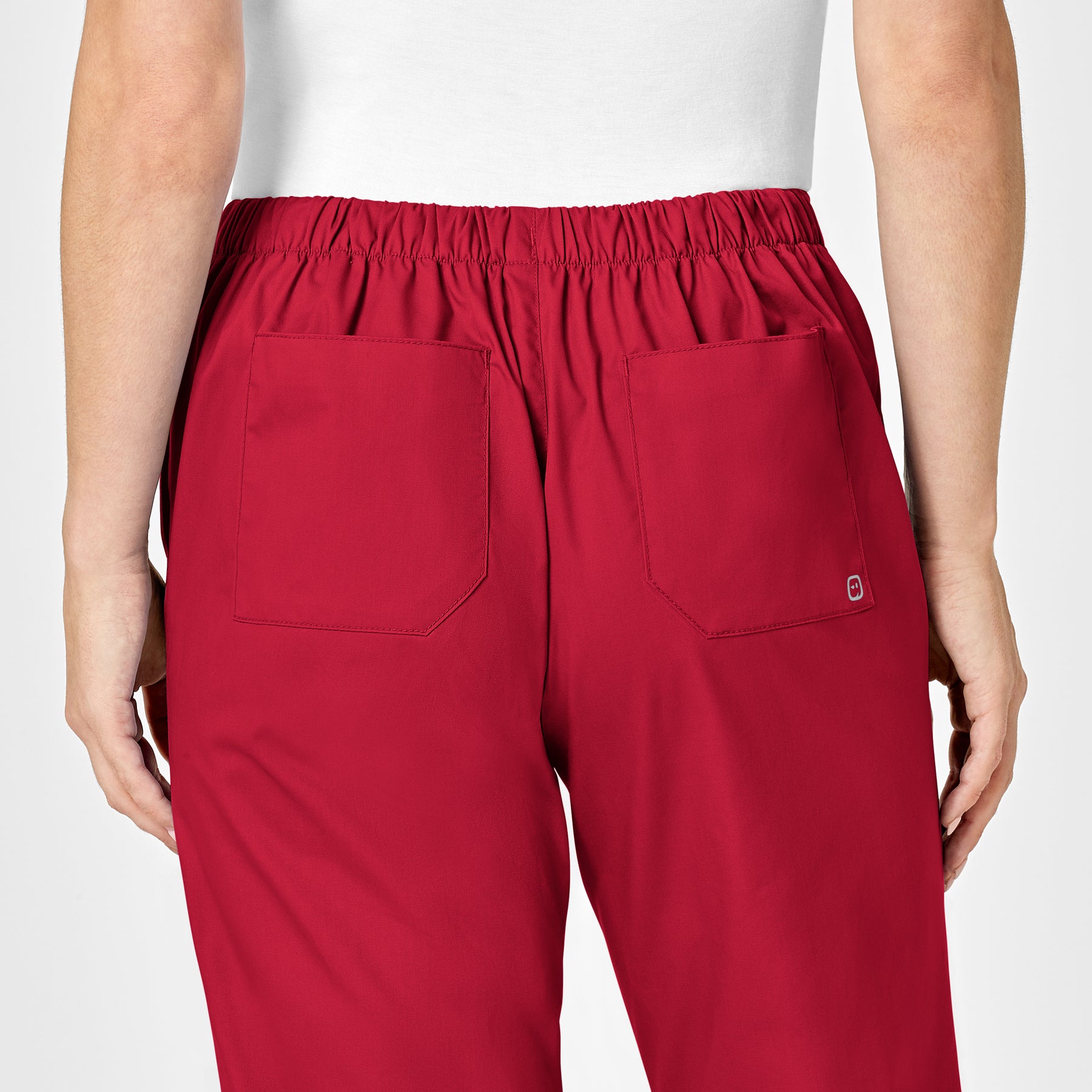 WonderWORK Women's Flare Leg Scrub Pant Red hemline detail