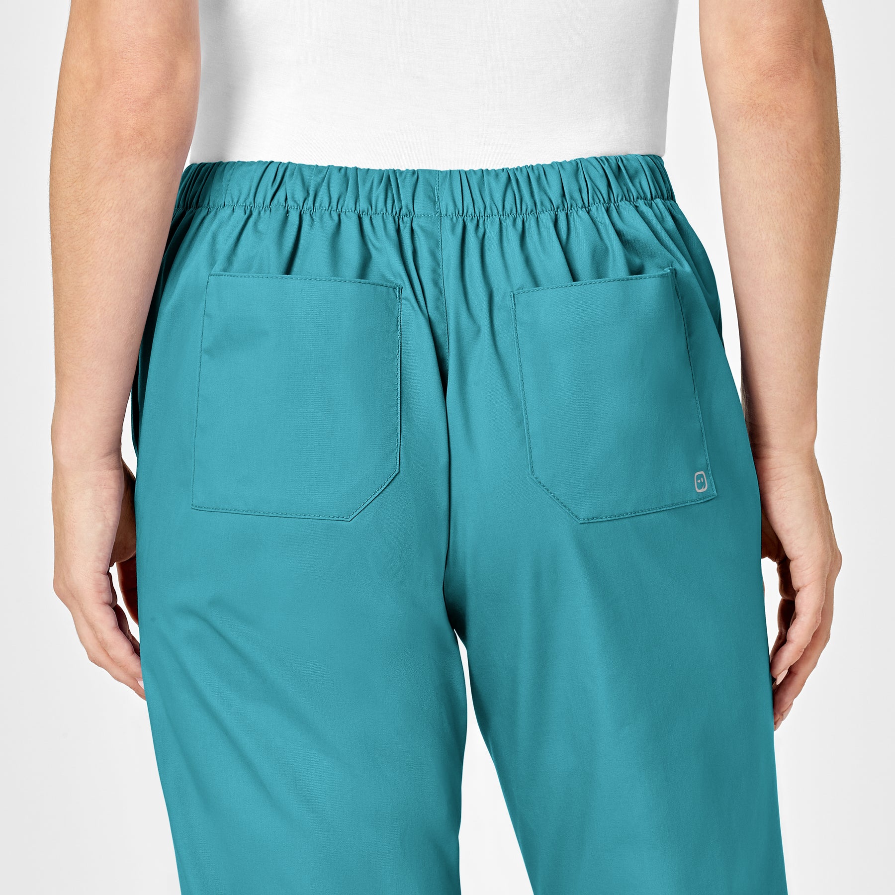 WonderWORK Women's Flare Leg Scrub Pant Teal Blue hemline detail