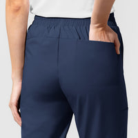 AURA Women's Glide Mid Rise Tapered Scrub Pant Navy hemline detail