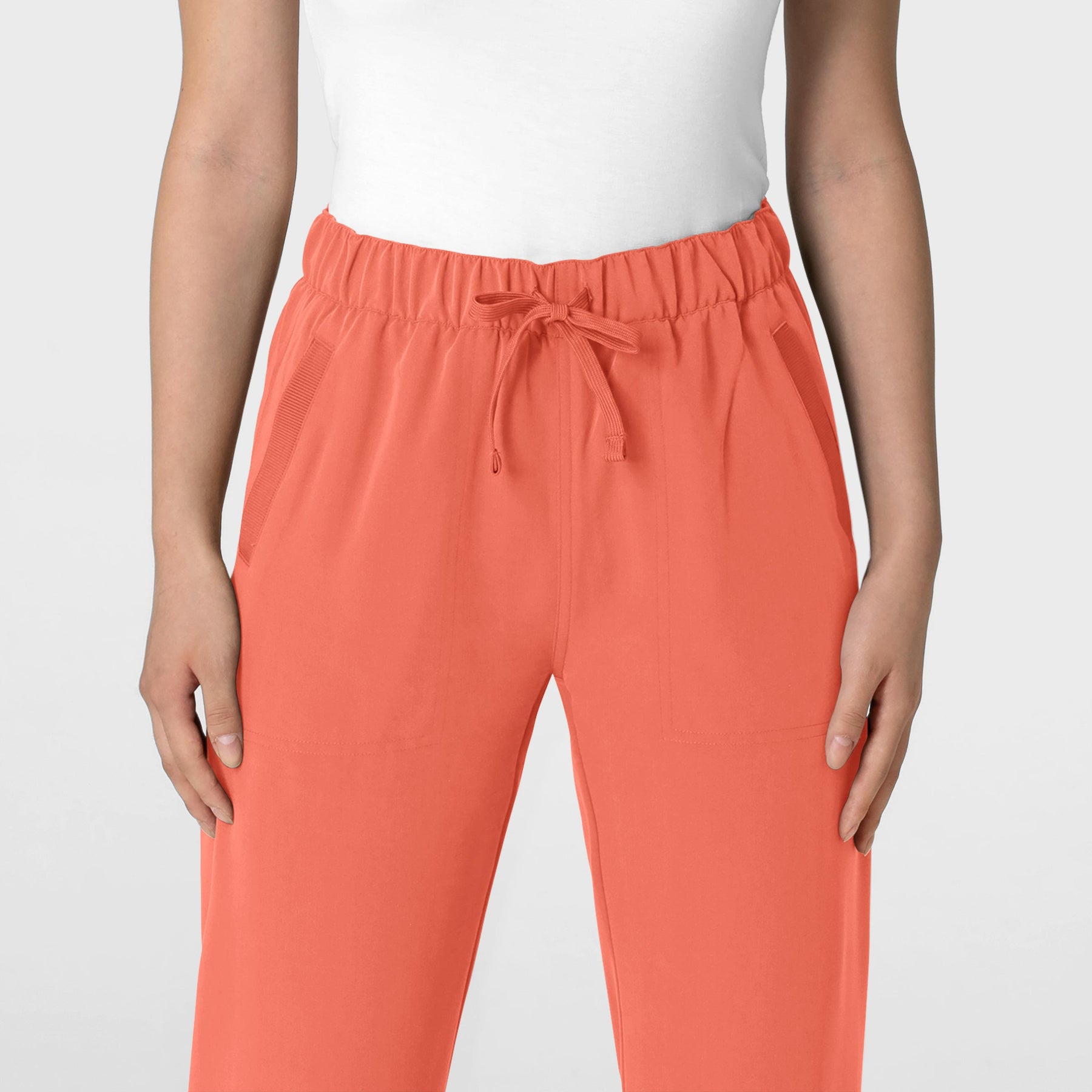 Nova Women's Stovepipe High-Low Hem Scrub Pant Sugar Coral front detail