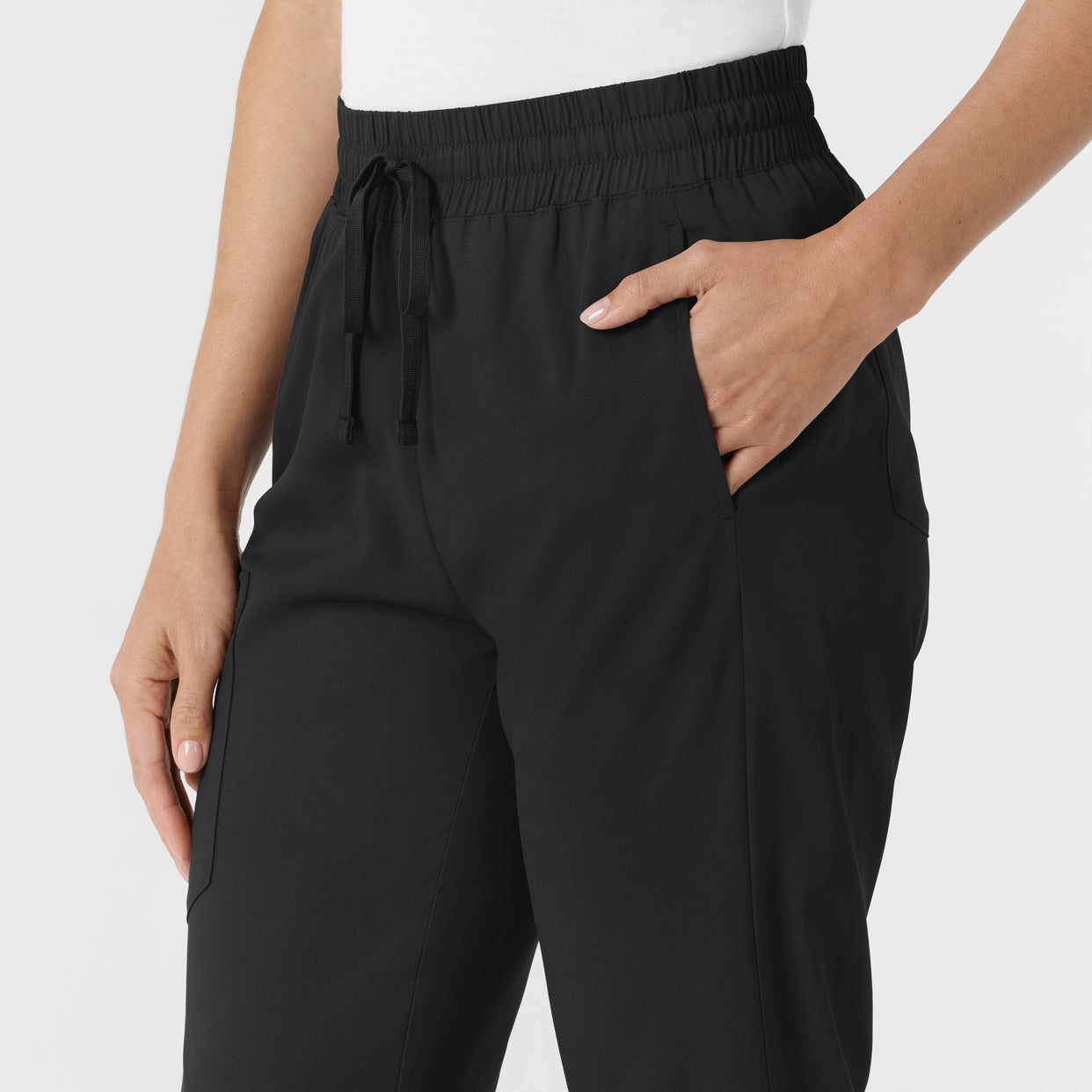 Boundless Women's Bootcut Scrub Pant Black hemline detail