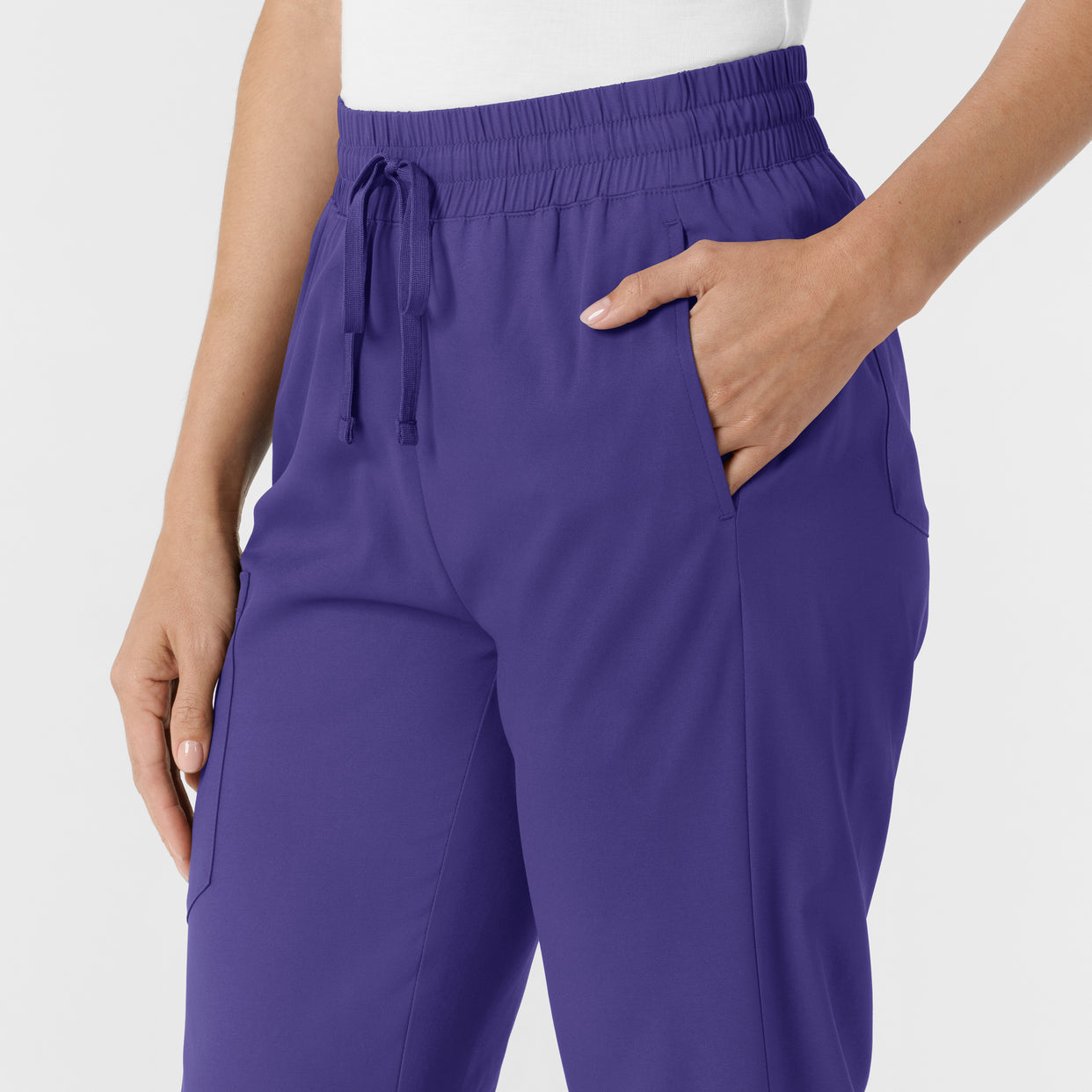 Boundless Women's Bootcut Scrub Pant Grape hemline detail