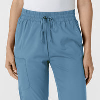 Boundless Women's Bootcut Scrub Pant Pacific Blue front detail