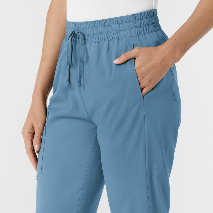 Boundless Women's Bootcut Scrub Pant Pacific Blue hemline detail
