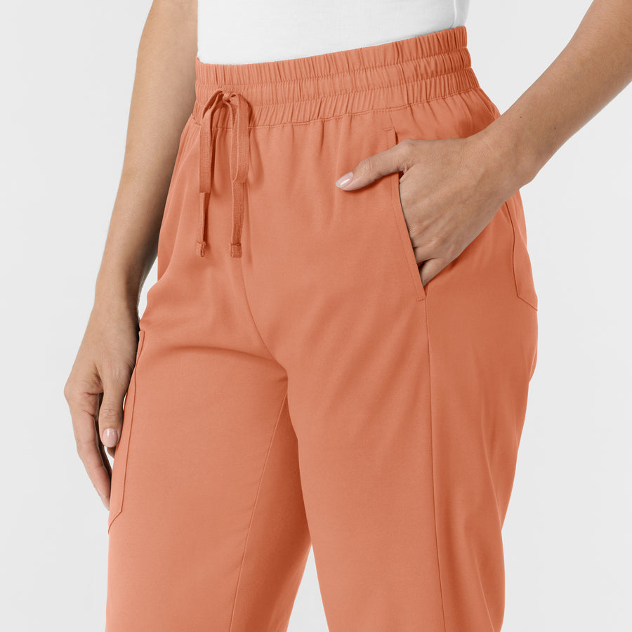 Boundless Women's Bootcut Scrub Pant Terracotta hemline detail
