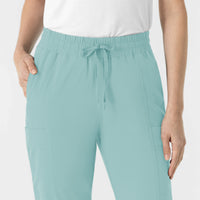 RENEW Women’s High Waist Tapered Scrub Pant Coastal Blue hemline detail
