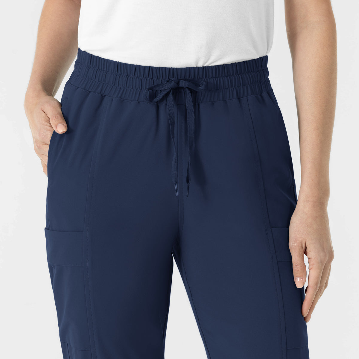 RENEW Women’s High Waist Tapered Scrub Pant Navy hemline detail