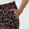 Boundless Women's Bootcut Scrub Pant Merry and Minty Black hemline detail