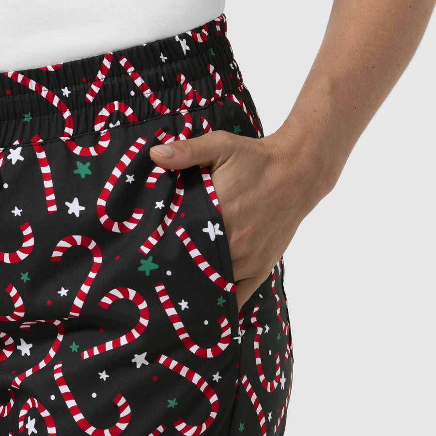 Boundless Women's Bootcut Scrub Pant Merry and Minty Black hemline detail