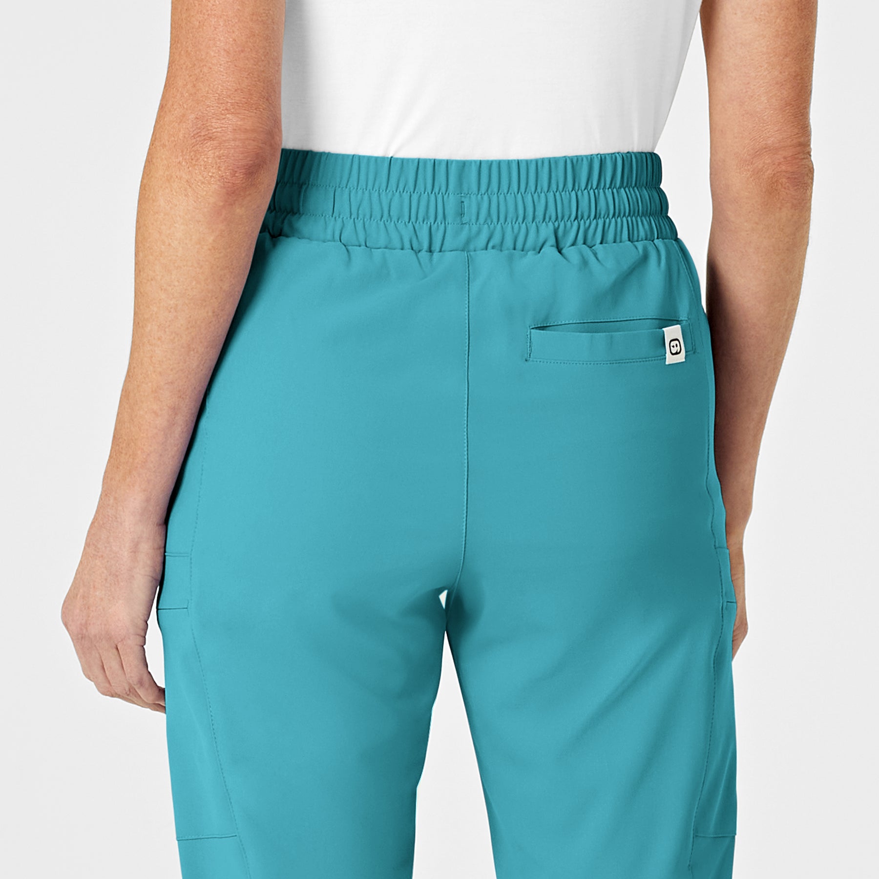 RENEW Women's High Waist Slim Leg Scrub Pant Teal Blue hemline detail