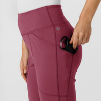 RENEW Knit Women's Flare Yoga Scrub Pant Carnation hemline detail