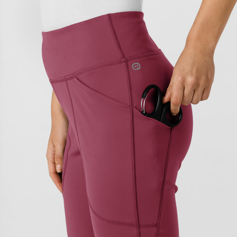 RENEW Knit Women's Flare Yoga Scrub Pant Carnation hemline detail