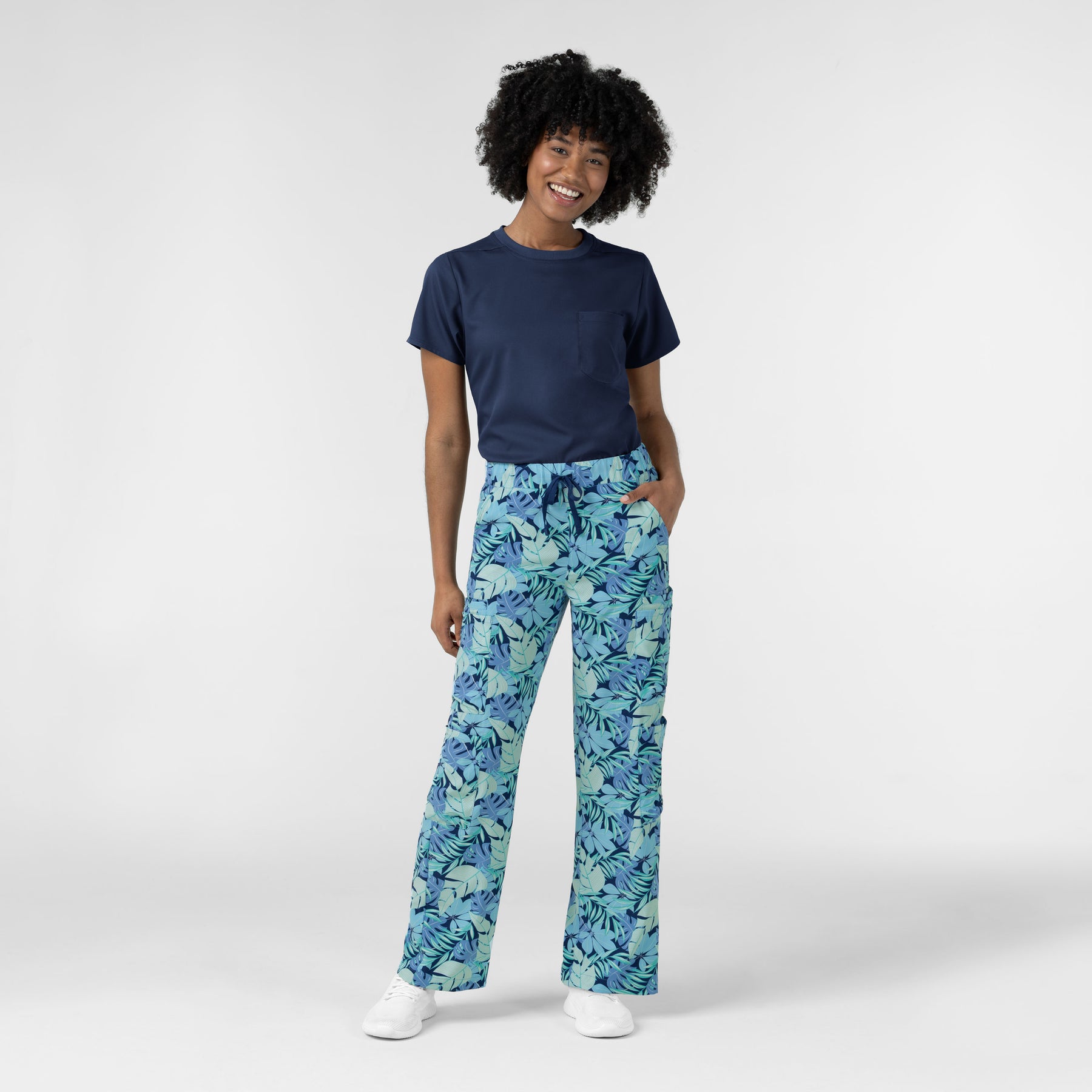 Women Printed Double Cargo Scrub Pant - Breezy Palms - with navy scrub top
