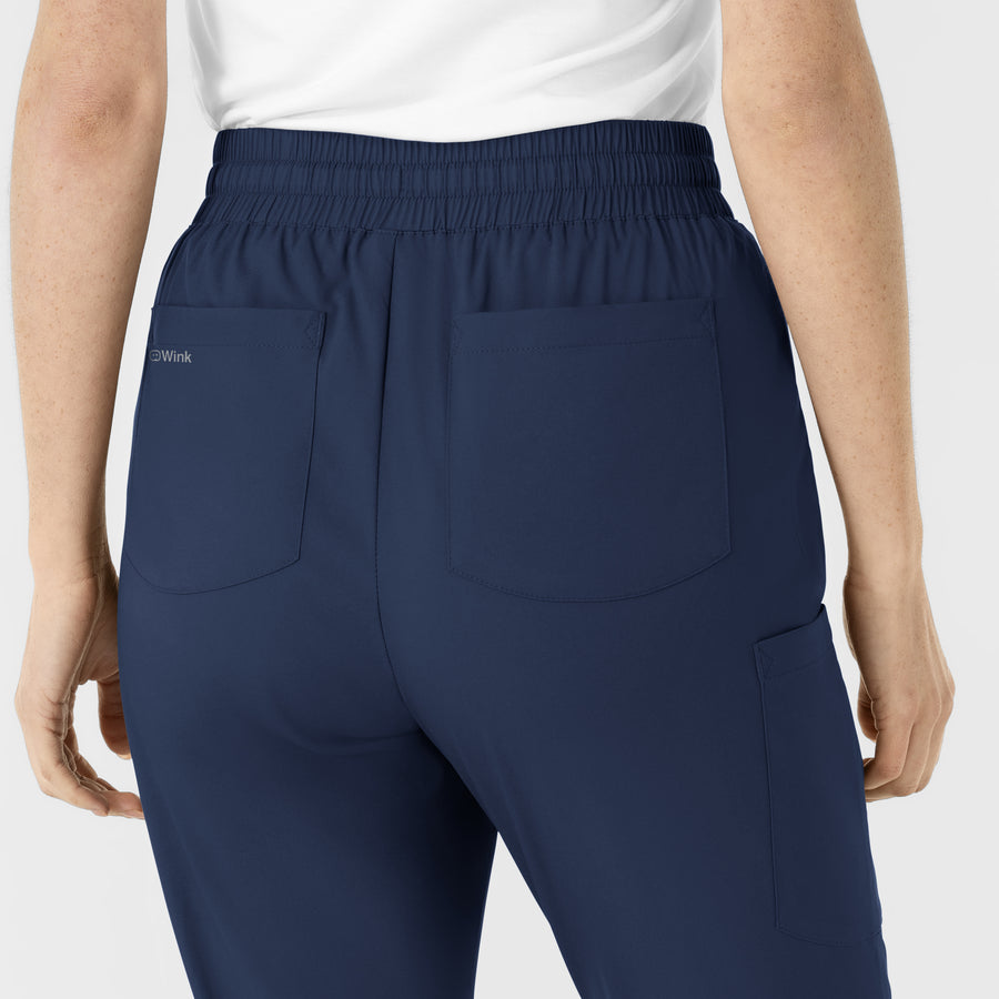 Boundless Women's Flare Leg Scrub Pant Navy hemline detail