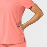 W123 Women's Flex-n-Reach V-Neck Scrub Top Paradise Pink hemline detail