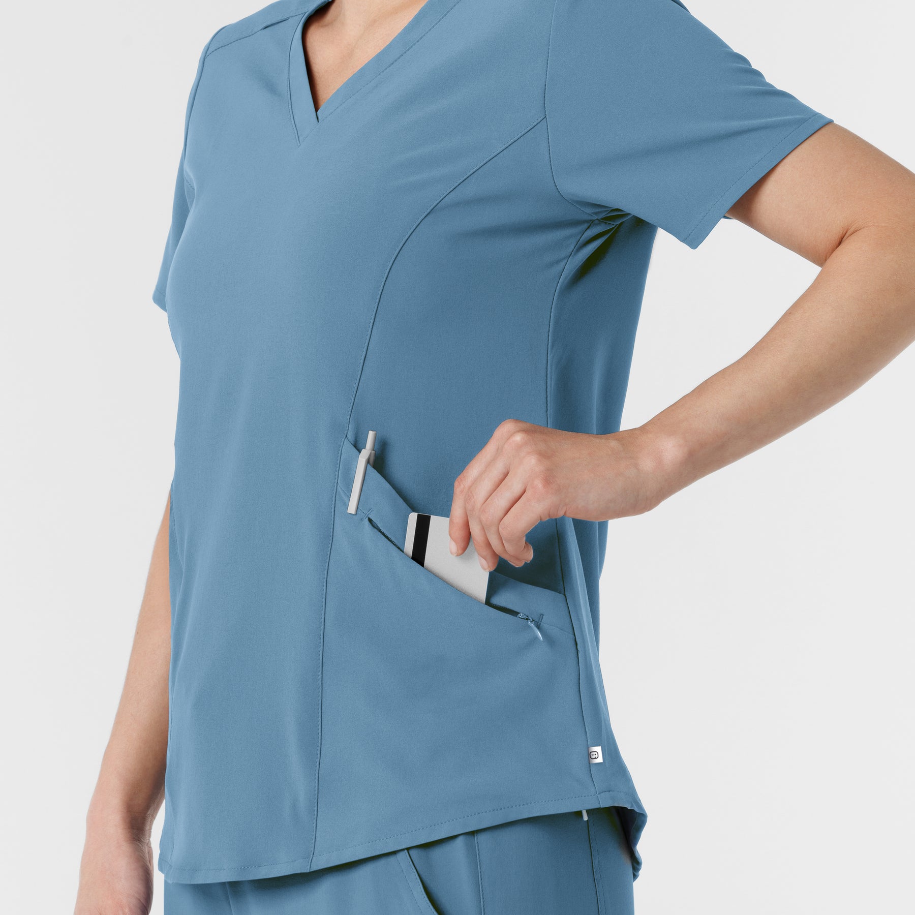RENEW Women's V-Neck Scrub Top - Pacific Blue left pockets