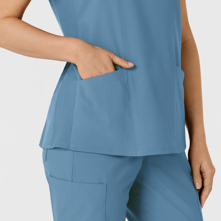 W123 Women's Flex-n-Reach Side Panel V-Neck Scrub Top Pacific Blue hemline detail