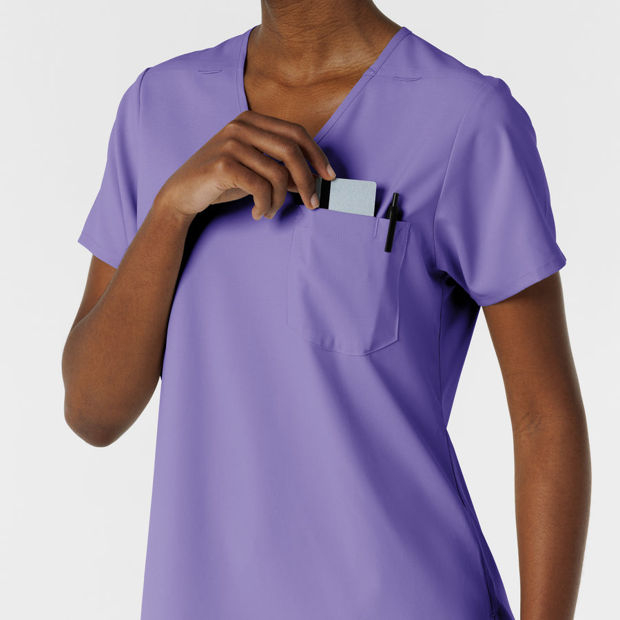 Boundless Women's Tuck-In Scrub Top Iris Purple hemline detail
