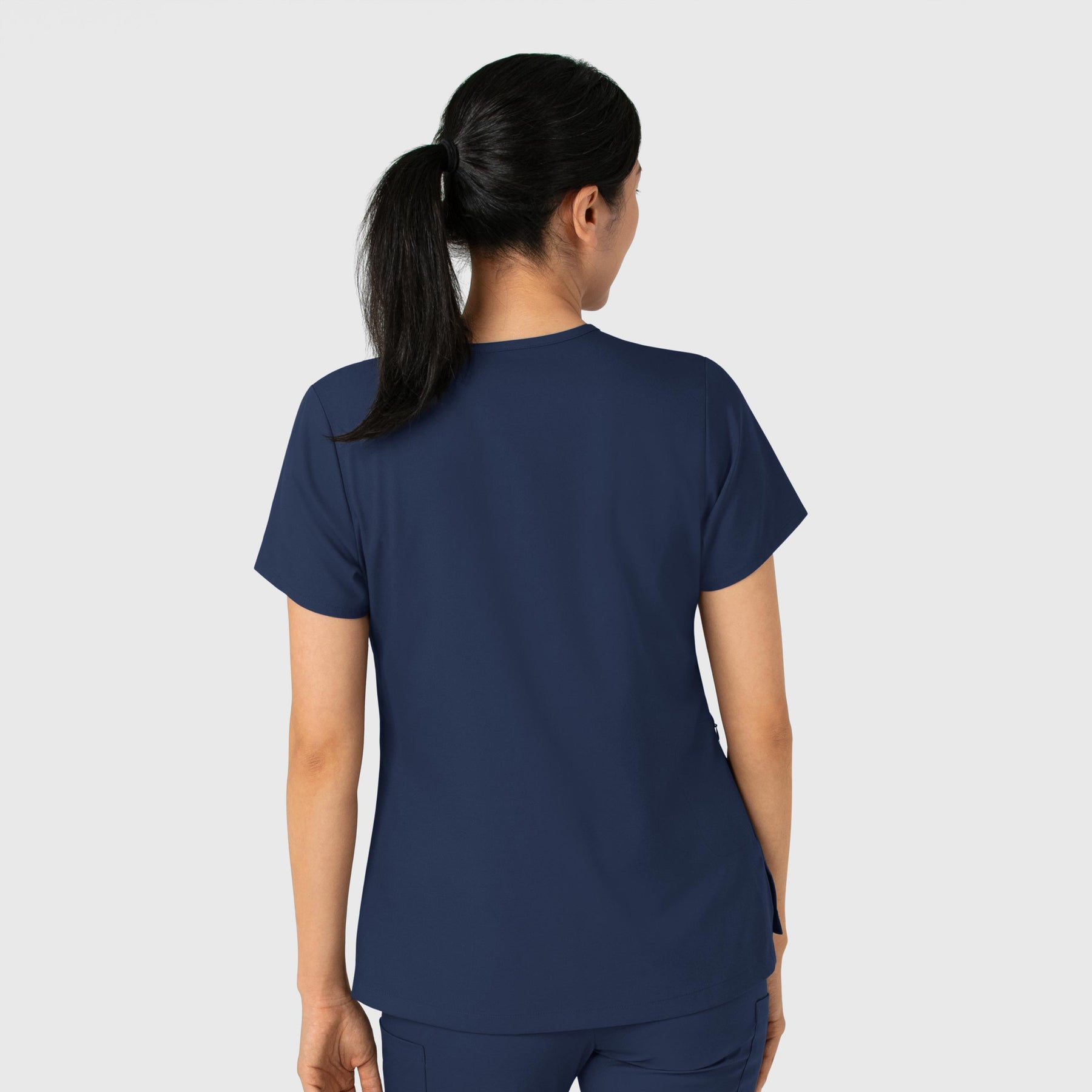 Boundless Women's Tuck-In Scrub Top Navy back view