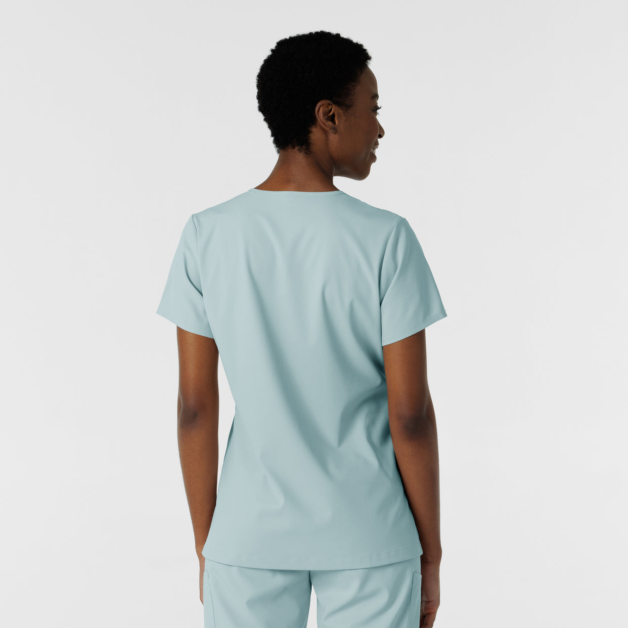 Boundless Women's Tuck-In Scrub Top Sky Blue back view