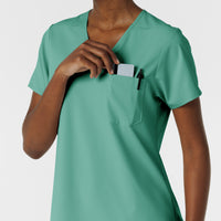 Boundless Women's Tuck-In Scrub Top Turquoise hemline detail