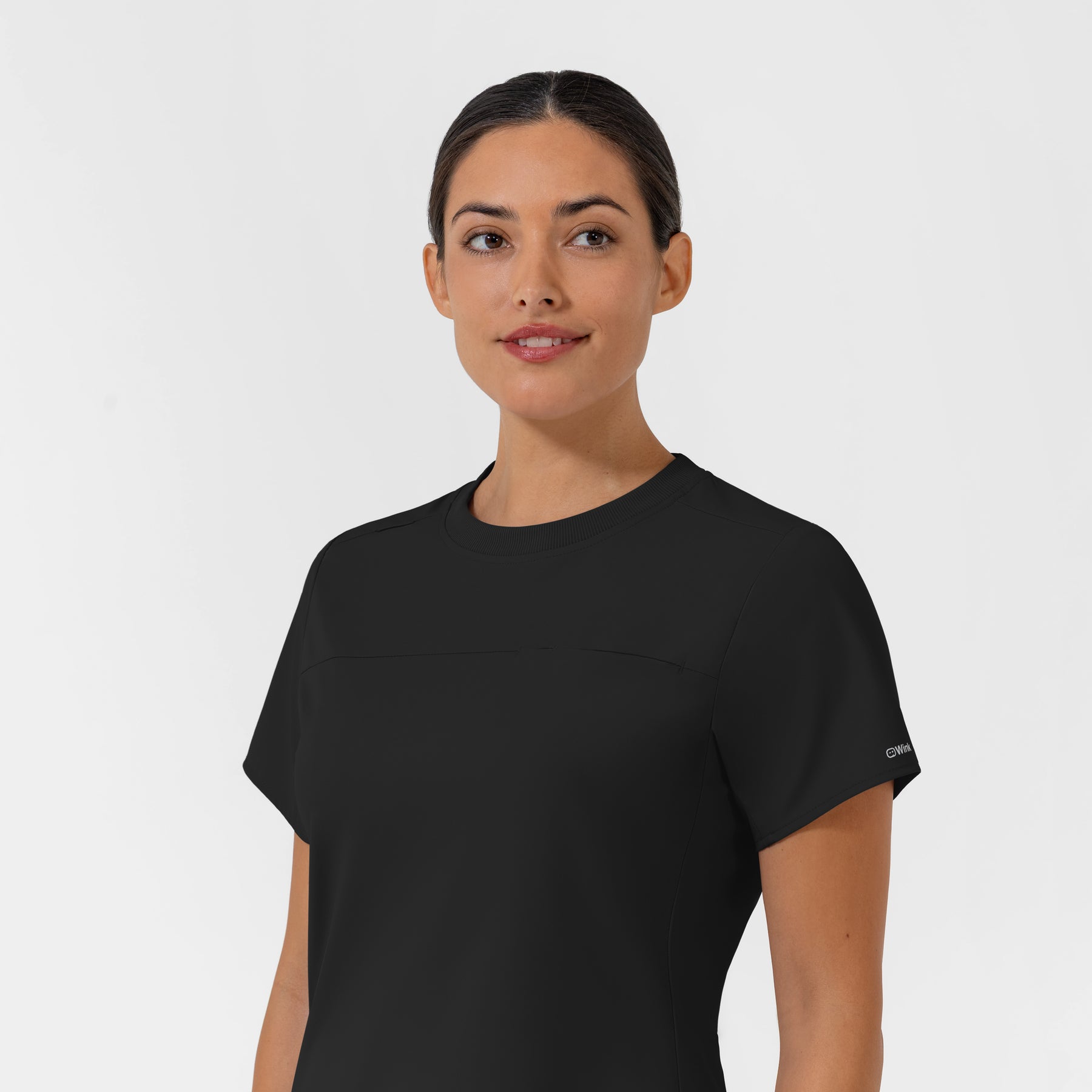 AURA Women's Captivate Crew Neck Tuck-in Scrub Top - Black neckline