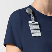 AURA Women's Captivate Crew Neck Tuck-in Scrub Top Navy side detail 2