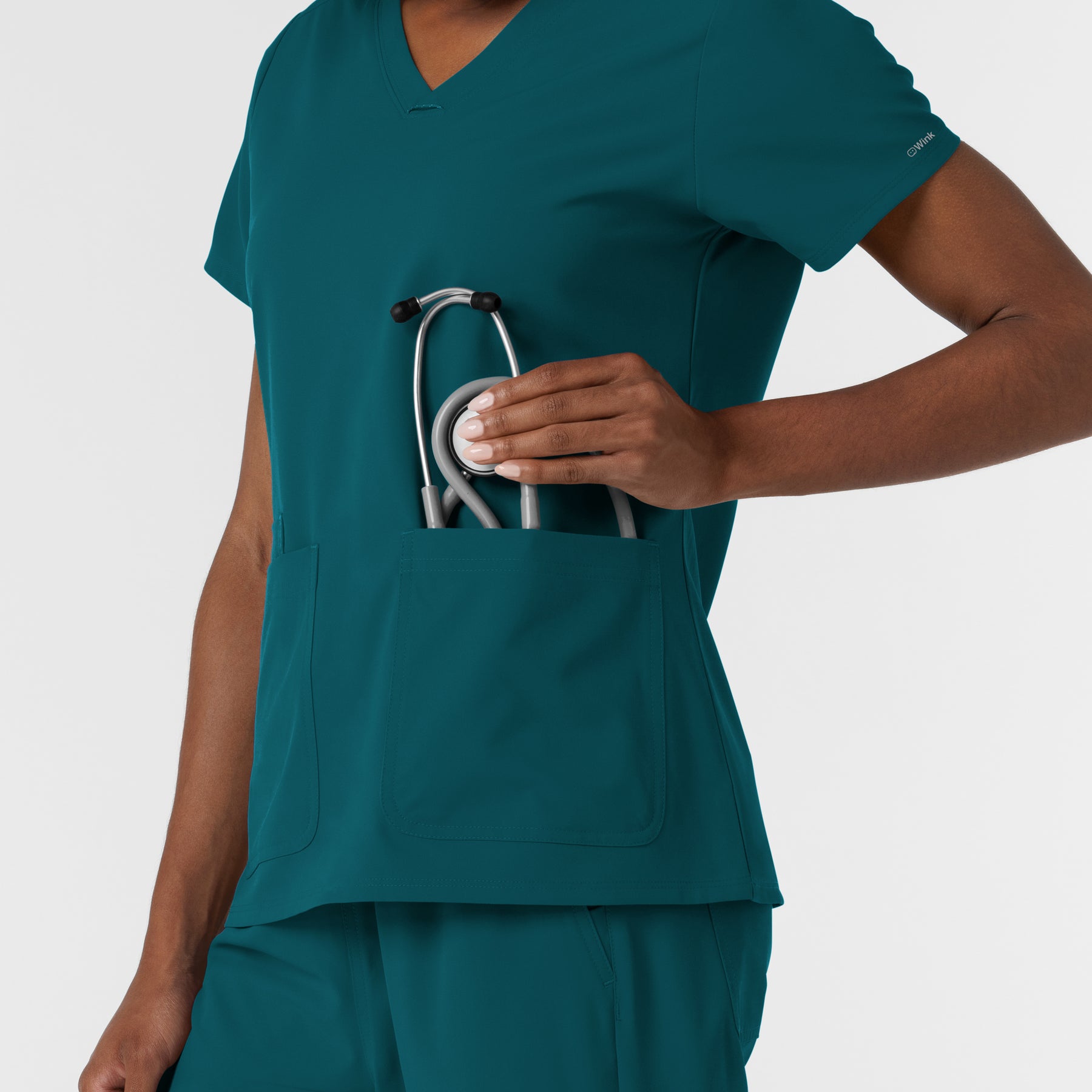 NURTUR Women's V-Neck Scrub Top - Caribbean pocket with stethoscope