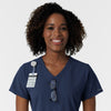 NURTUR Women's V-Neck Scrub Top - Navy badge and glasses loop