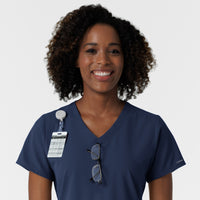 NURTUR Women's V-Neck Scrub Top - Navy badge and glasses loop