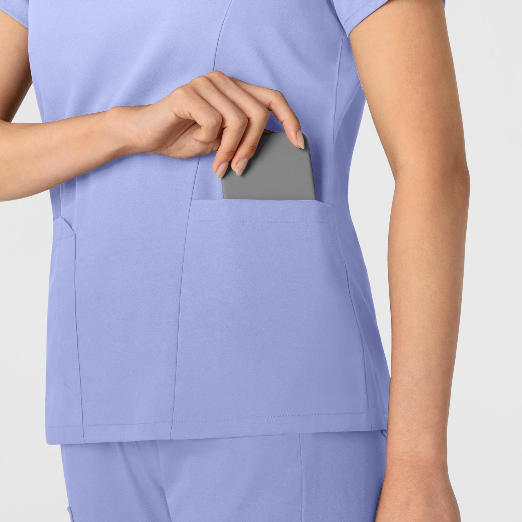 Boundless Women's 2-Pocket V-Neck Scrub Top Ceil Blue hemline detail