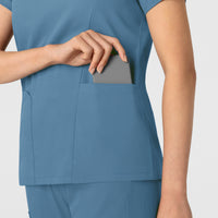 Boundless Women's 2-Pocket V-Neck Scrub Top Pacific Blue hemline detail