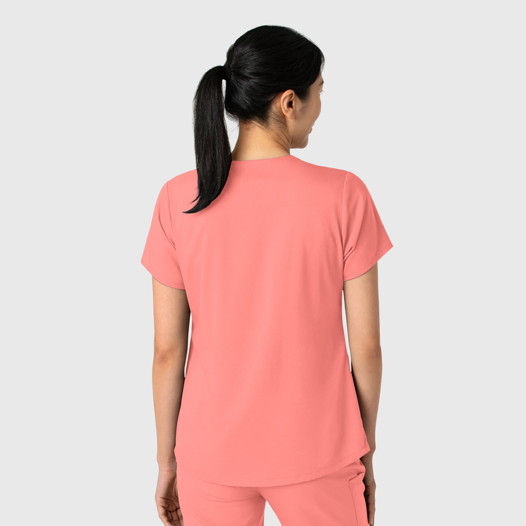 Boundless Women's 2-Pocket V-Neck Scrub Top Paradise Pink back view