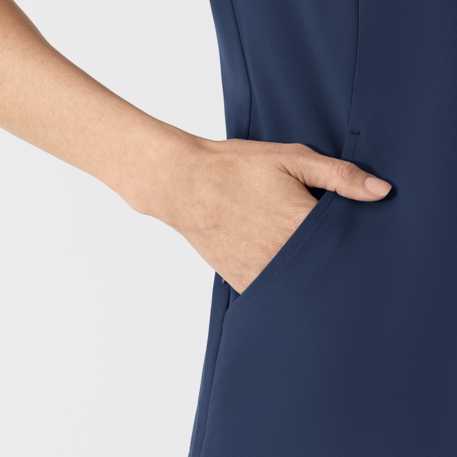 RENEW Women's V-Neck Scrub Top Navy hemline detail