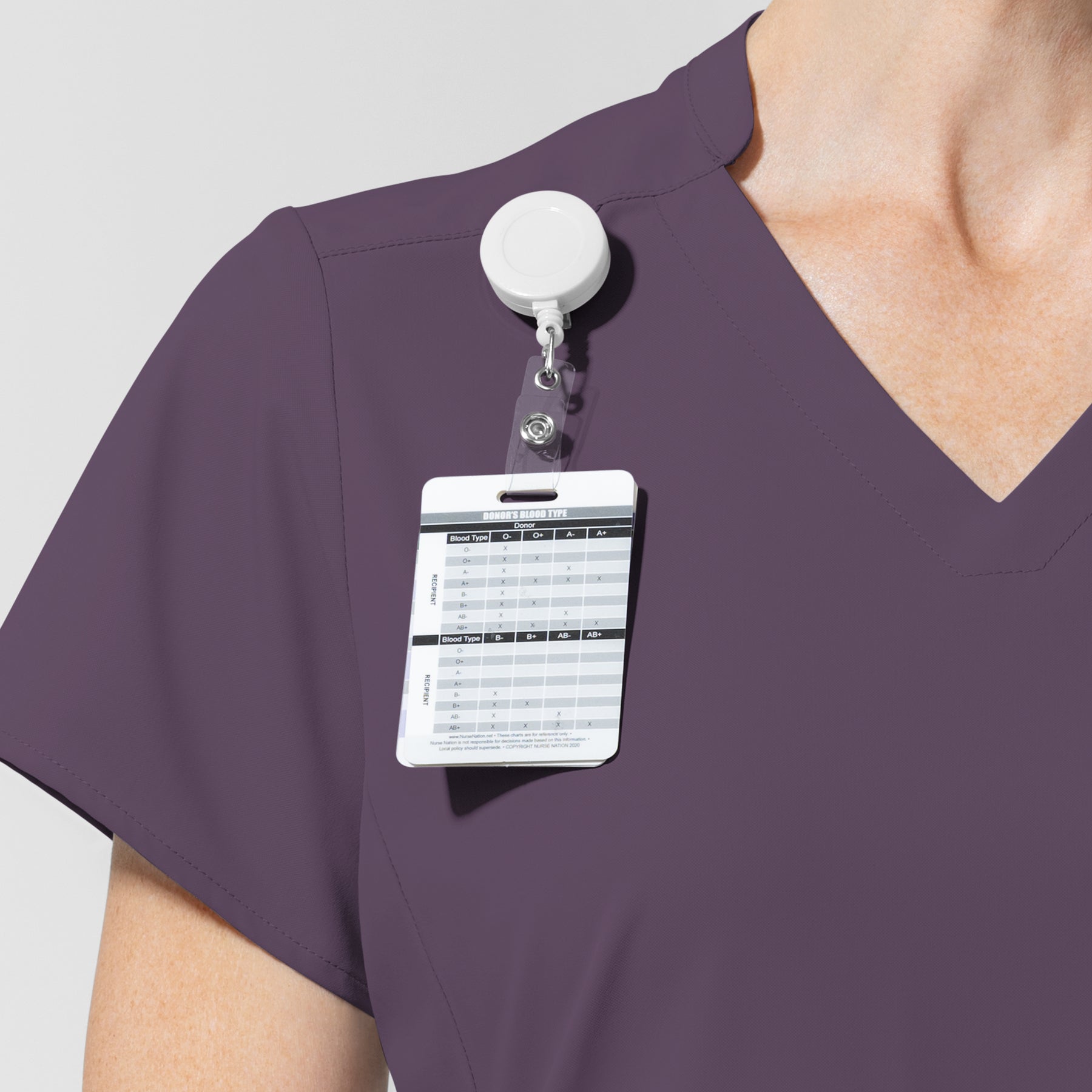 AURA Women's Allure V-Neck 2 Pocket Scrub Top Dusk hemline detail