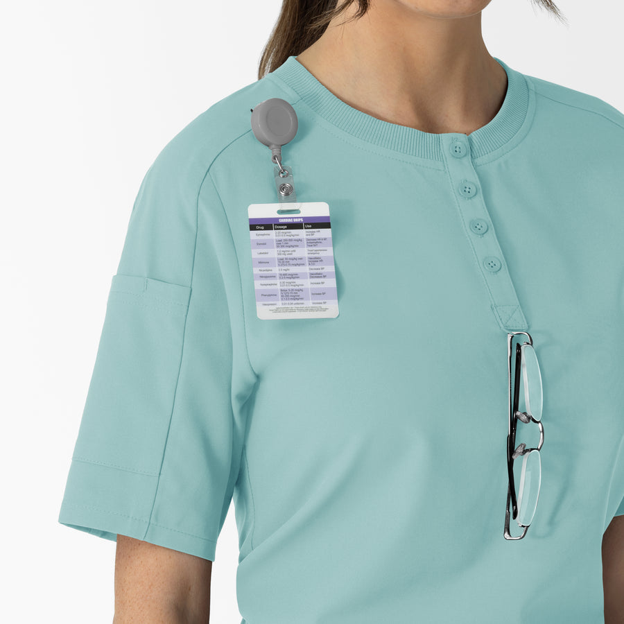 RENEW Women's Tuck-In Henley Scrub Top Coastal Blue hemline detail