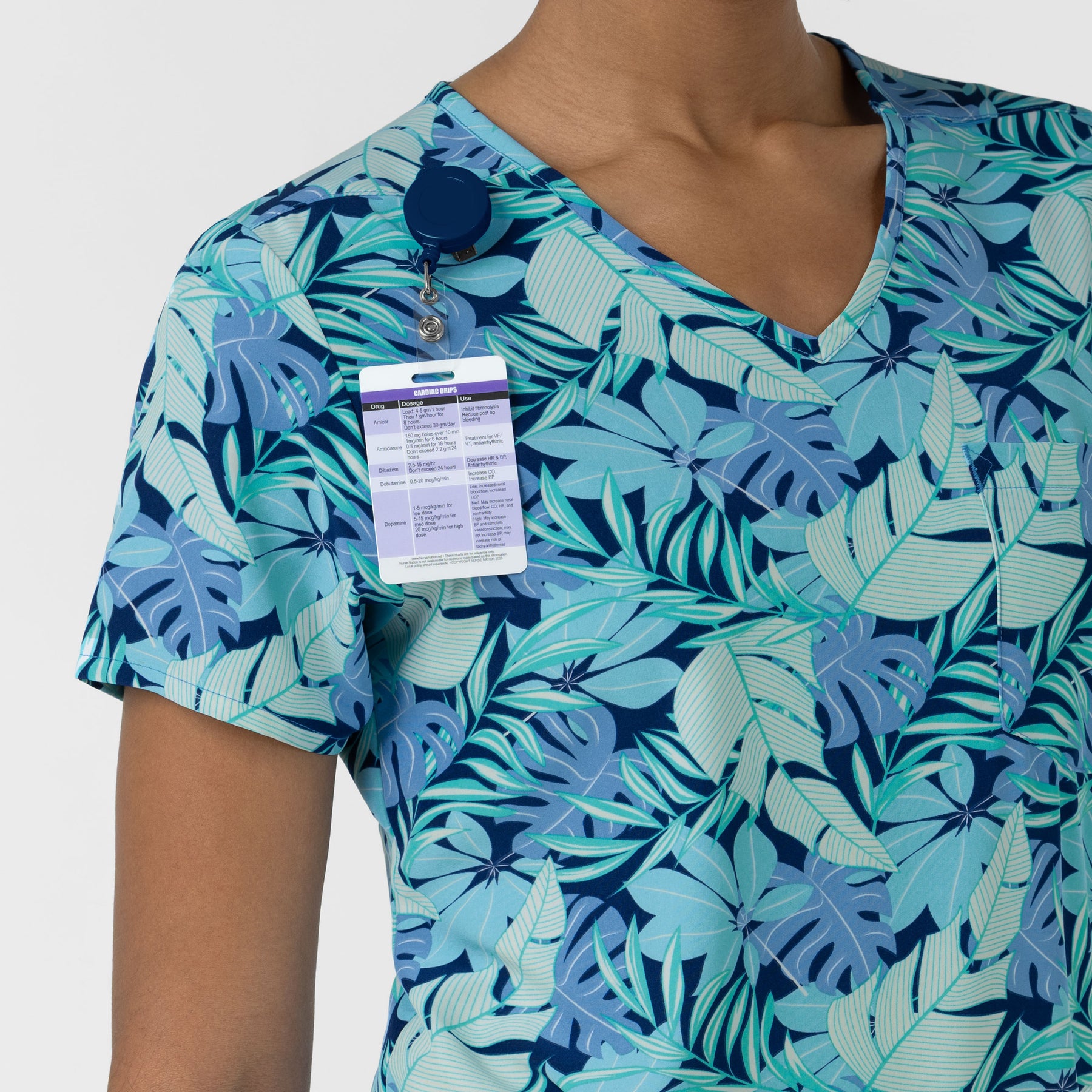 Women's 1-Pocket Tuck-in Print Scrub Top - Breezy Palms second badge loop